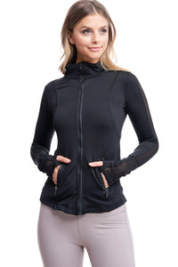 Girl wearing Shape Up Athletics "Gower" mesh jacket in black with thumb holes.