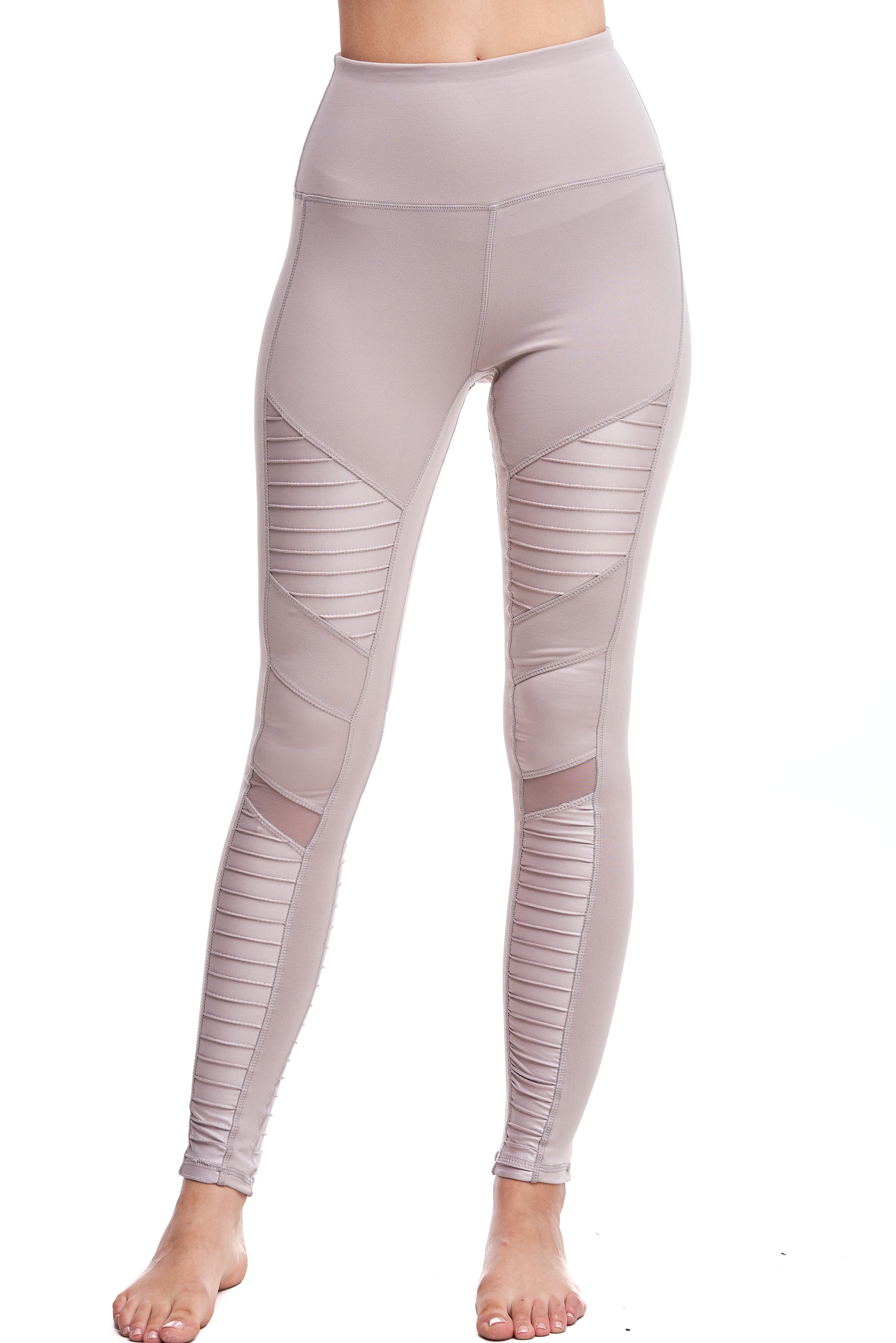 Girl wearing Shape Up Athletics "Mia" Moto Leggings in nude with mesh on legs