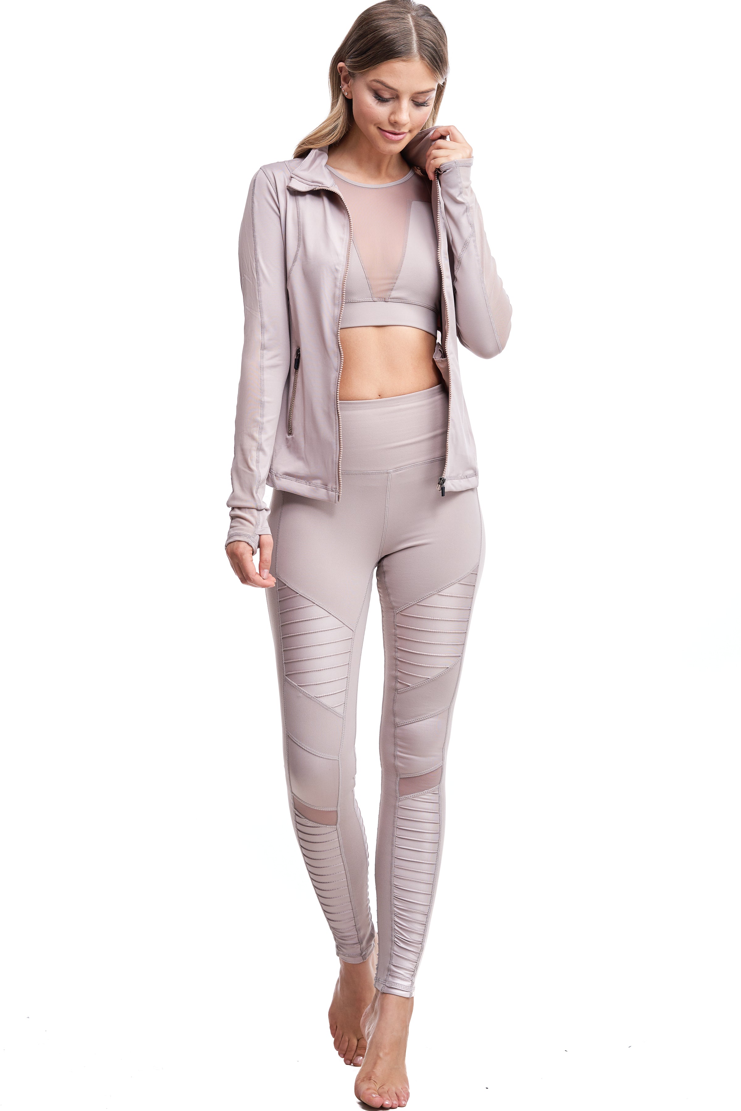 Girl wearing Shape Up Athletics "Mia" Moto Leggings in nude with mesh on legs