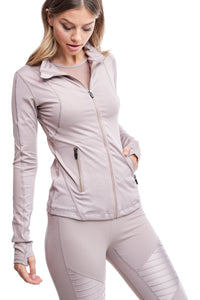 Girl wearing Shape Up Athletics "Gower" mesh jacket in nude with mesh on sleeves