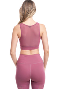 Girl wearing Shape Up Athletics "Lilla" v-neck mesh sports bra in mauve