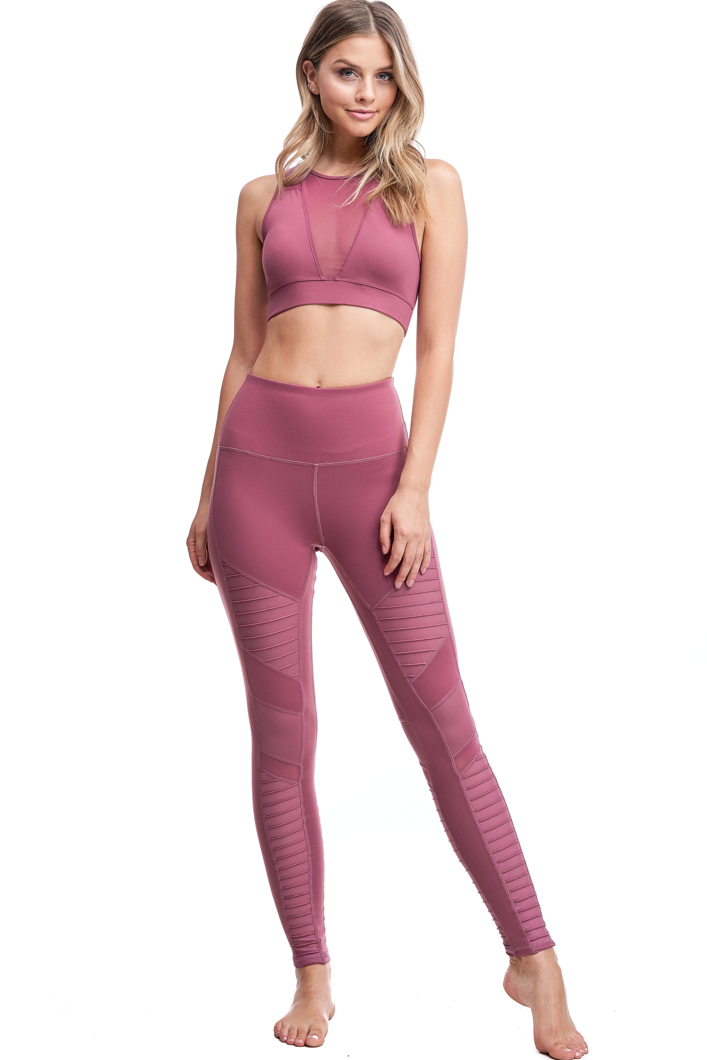 Girl wearing Shape Up Athletics "Lilla" v-neck mesh sports bra in mauve and wearing Shape Up Athletics "Mia" Moto Leggings in mauve