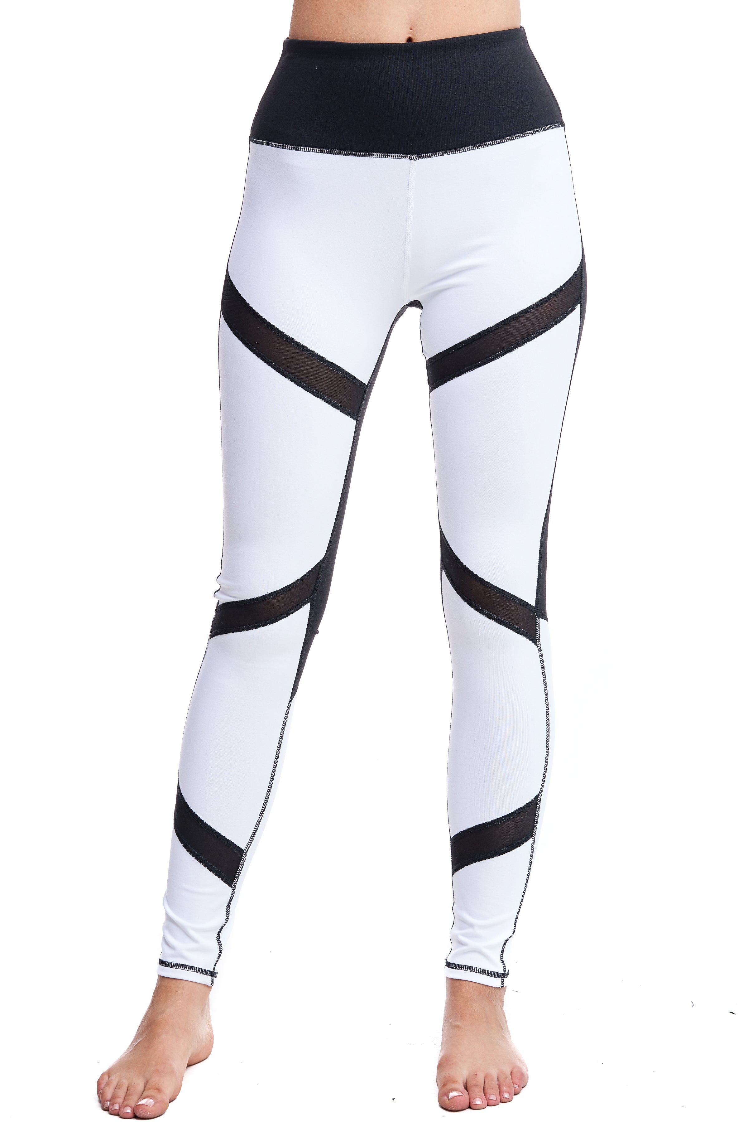 Girl wearing Shape Up Athletics Moonlight Magic Leggings with black mesh panels throughout leg.