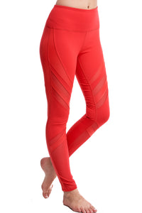 Girl wear Shape Up Athletics red leggings with mesh going from thigh to calf.