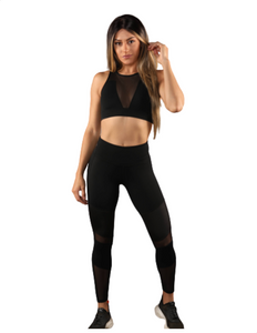 Girl wearing Shape Up Athletics Satin Touch Black Leggings with satin patches and mesh patches on leg